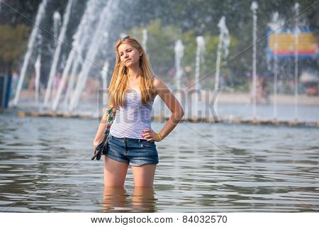 Beautiful Girl Standing In Water