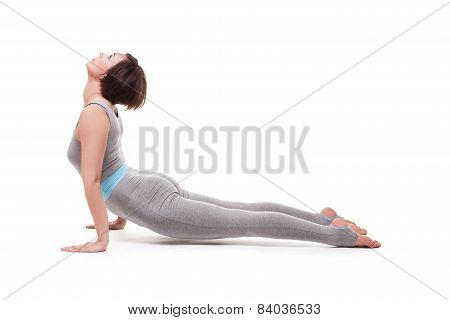 young beautiful woman yoga posing. isolated