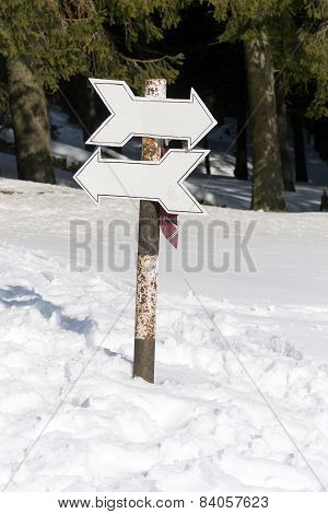 2 route signs in the mountains