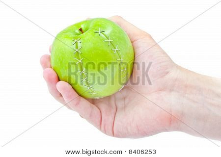 แอปเปิ้ลเขียวในมือผู้ชาย