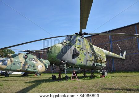Old military helicopter on an airport