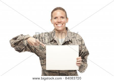 Female Airman Showing Placard