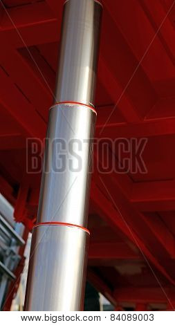 Stainless Steel Hydraulic Cylinder Below The Caisson Tipper Truck In The Yard