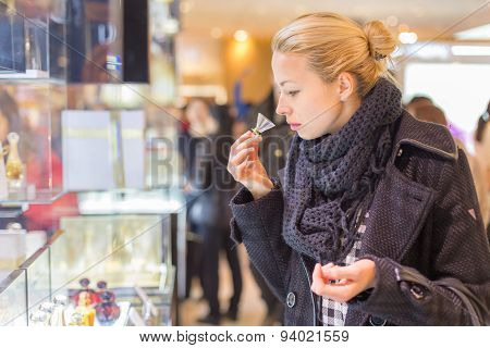 Beautiful woman shopping in beauty store.