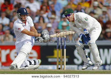 MANCHESTER, ENGLAND - August 03 2013: Jonny Bairstow and Brad Haddin during day three of  the Investec Ashes 3rd test match at Old Trafford Cricket Ground, on August 03, 2013 in London, England.