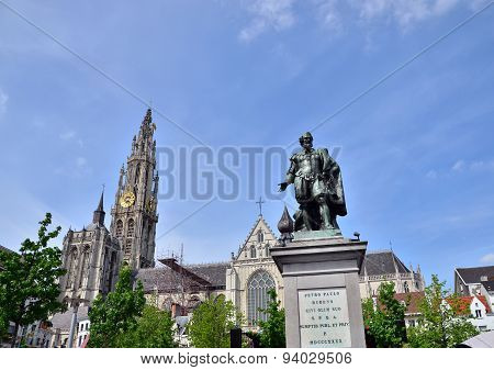 Antwerp, Belgium - May 10, 2015: Statue Of Rubens With Cathedral Of Our Lady In Antwerp, Belgium.