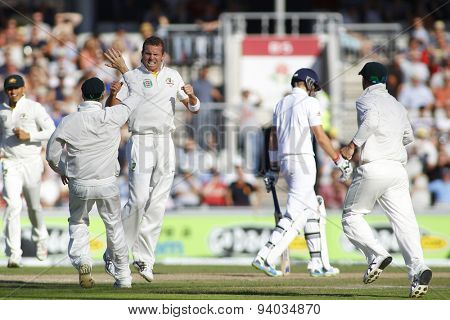 MANCHESTER, ENGLAND - August 02 2013: Peter Siddle celebrates taking the wicket of Joe Root during day two of  the Investec Ashes 3rd test match at Old Trafford Cricket Ground