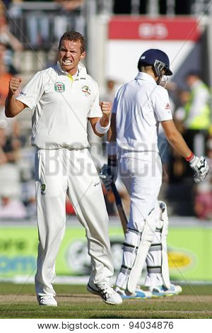 MANCHESTER, ENGLAND - August 02 2013: Peter Siddle celebrates taking the wicket of Joe Root during day two of  the Investec Ashes 3rd test match at Old Trafford Cricket Ground