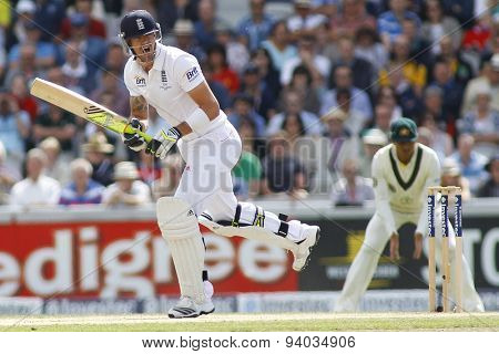 MANCHESTER, ENGLAND - August 03 2013: Kevin Pietersen shouts no to partner Alastair Cook to stop a run being taken during day three of  the Investec Ashes 3rd test match at Old Trafford Cricket Ground