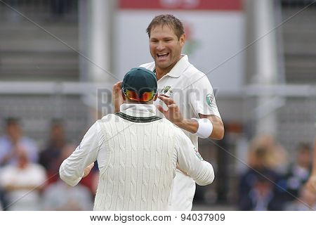 MANCHESTER, ENGLAND - August 05 2013: Ryan Harris celebrates taking the wicket of Jonathan Trott during day five of  the Investec Ashes 4th test match at Old Trafford Cricket Ground, August 05, 2013 