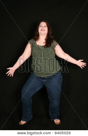Full Length Of Happy Overweight Woman