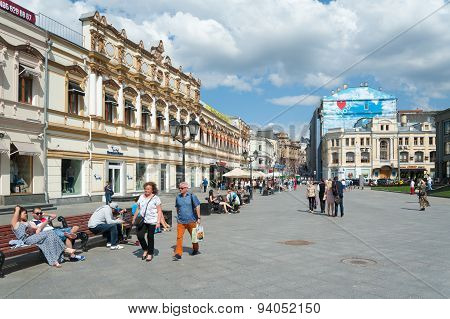 People Walking And Sitting On Benches On Kuznetsky Most Street
