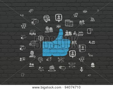 Social media concept: Thumb Up on wall background