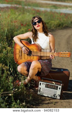 Beautiful girl with a guitar