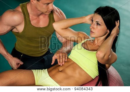 Fitness Youple Workout - Fit Mann And Woman Train In Gym