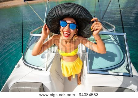 Woman having fun on the yacht