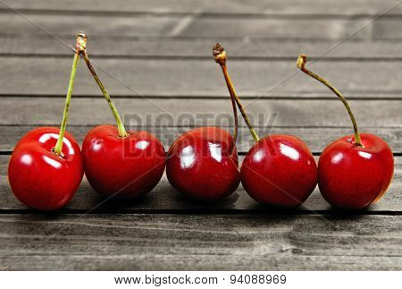 Cherries On Wooden Table