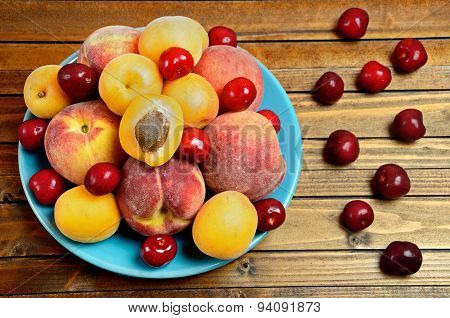 Plate With Fruits On Table