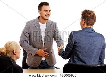Business meeting-three people sitting and talking