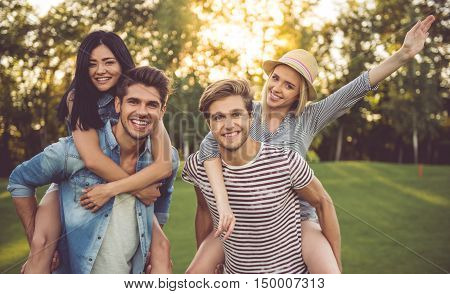 Friends Resting In Park