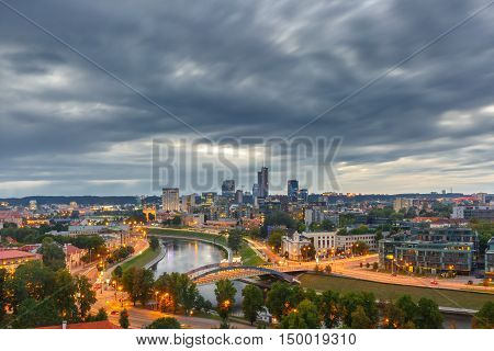 Aerial panoramic cityscape with skyscrapers of New Center of Vilnius from Gediminas Tower in the cloudy evening, Lithuania, Baltic states.