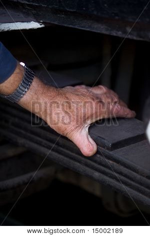 Hand Working On A Steel Plate