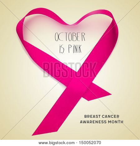 the text october is pink, a pink ribbon forming a heart and the text breast cancer awareness month on a beige background