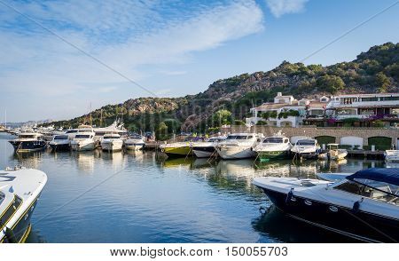 Motor and sailing yachts at Poltu Quatu resort marina, Sardinia, Italy.