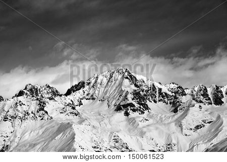 Black And White Snow Mountains In Winter Sun Day And Sky With Clouds