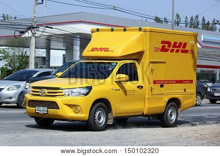 CHIANGMAI THAILAND -FEBRUARY 29 2016: DHL Express and Logistics Container Pickup truck. Modify from Toyota Hilux Revo. Photo at road no 121 about 8 km from downtown Chiangmai thailand.