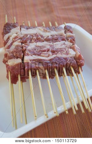 raw abruzzese mini sheep skewers called arrosticini