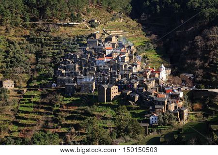 Small village in Portugal, where its schist houses are the main attraction. In the distance the village looks like a crib in the middle of the mountain.