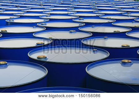 metal barrels of blue color on a white backgroun