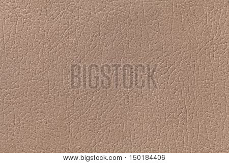 Light brown leather texture background with pattern closeup.
