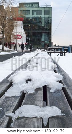 South Boston Massachusetts USA - February 11 2016: Icy winter morning along Harborwalk near Boston Children's Museum