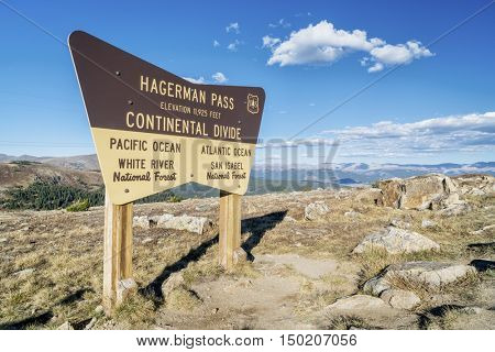 HAGERMAN  PASS, SEPTEMBER 27, 2016: US Forest Service sign at a summit of Hagerman Pass and continental divide in Colorado's Rocky Mountains.