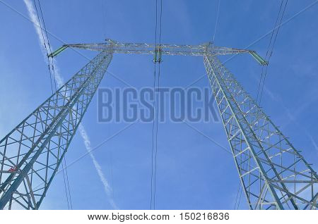 Power pole high voltage line below view