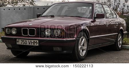 Kazakhstan, Ust-Kamenogorsk, october 2, 2016: BMW 7 E32, old car, old german car in the street, old BMW, sedan