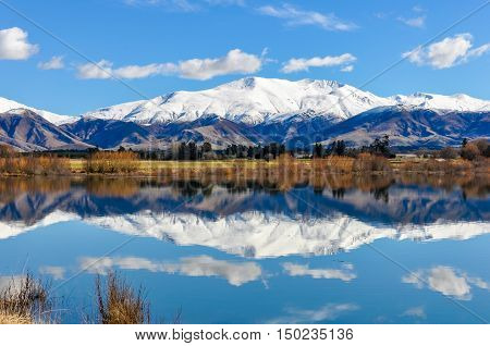 Reflection Of Snowy Mountains Near Fairlie, New Zealand