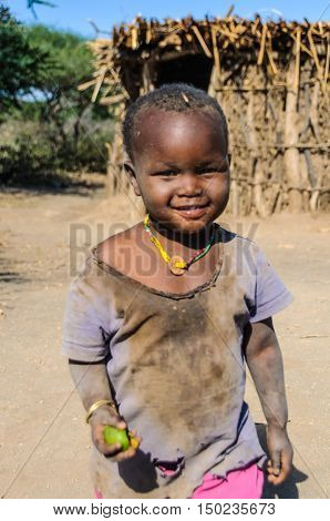 LAKE EYASI, TANZANIA - MAY 29, 2015: Cute kid from a datoga tribe at Lake Eyasi Tanzania
