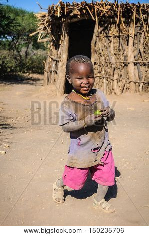 LAKE EYASI, TANZANIA - MAY 29, 2015: Cute kid from a datoga tribe at Lake Eyasi Tanzania