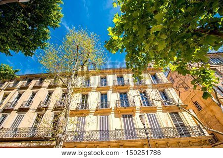 Beautiful residential building facade in Aix-en-Provence in France. Typical french architecture in Provence