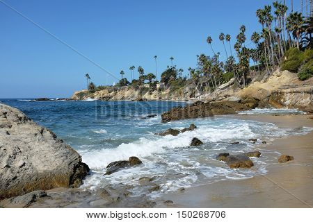 The Coastline at Laguna Beach, California, looking towards Recreation Point, with Heisler Park running along the bluff.