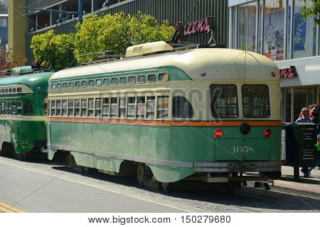 SAN FRANCISCO - MARCH 14, 2014: F-line Antique PCC streetcar No.1058 Chicago in Fisherman's Wharf in San Francisco, California, USA.