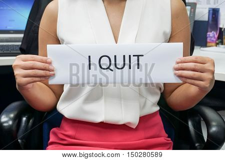 Woman in pink skirt quit from the job