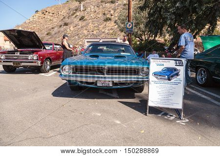 Laguna Beach, CA, USA - October 2, 2016: Blue 1970 Plymouth Cuda displayed at the Rotary Club of Laguna Beach 2016 Classic Car Show. Editorial use.