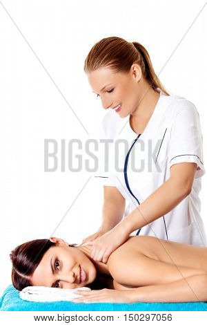 Woman having massage of body in the spa salon. Beauty treatment concept.