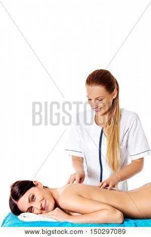 Woman having massage of body in the spa salon. Beauty treatment concept.