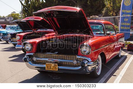 Laguna Beach, CA, USA - October 2, 2016: Red 1957 Chevrolet Bel Air 2 Door Hardtop owned by Len Yerkes and displayed at the Rotary Club of Laguna Beach 2016 Classic Car Show. Editorial use.
