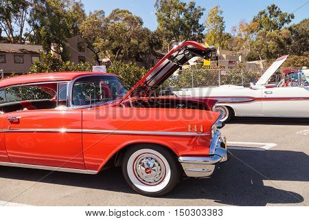 Laguna Beach, CA, USA - October 2, 2016: Red 1957 Chevrolet Bel Air 2 Door Hardtop owned by Len Yerkes and displayed at the Rotary Club of Laguna Beach 2016 Classic Car Show. Editorial use.